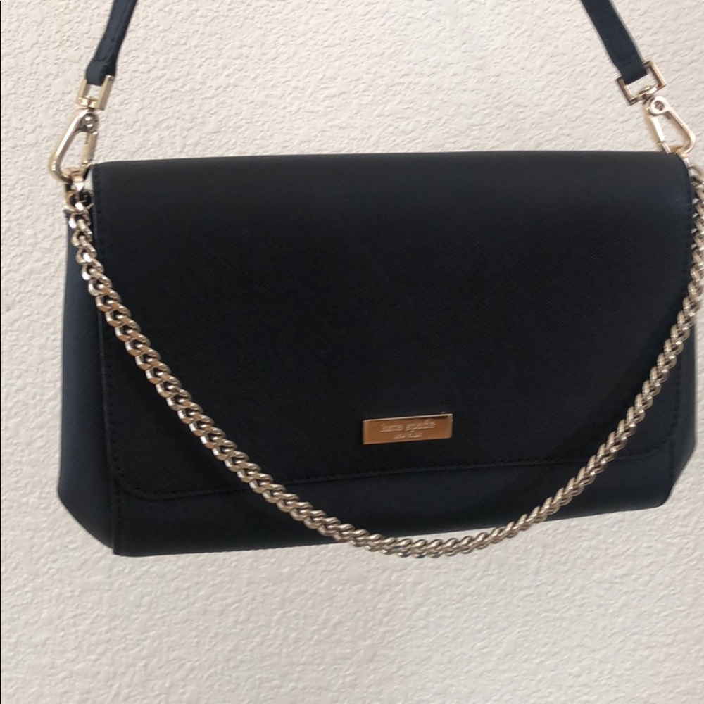 Kate spade crossbody. About 11” L, 6” H, and 1 1/2” W.